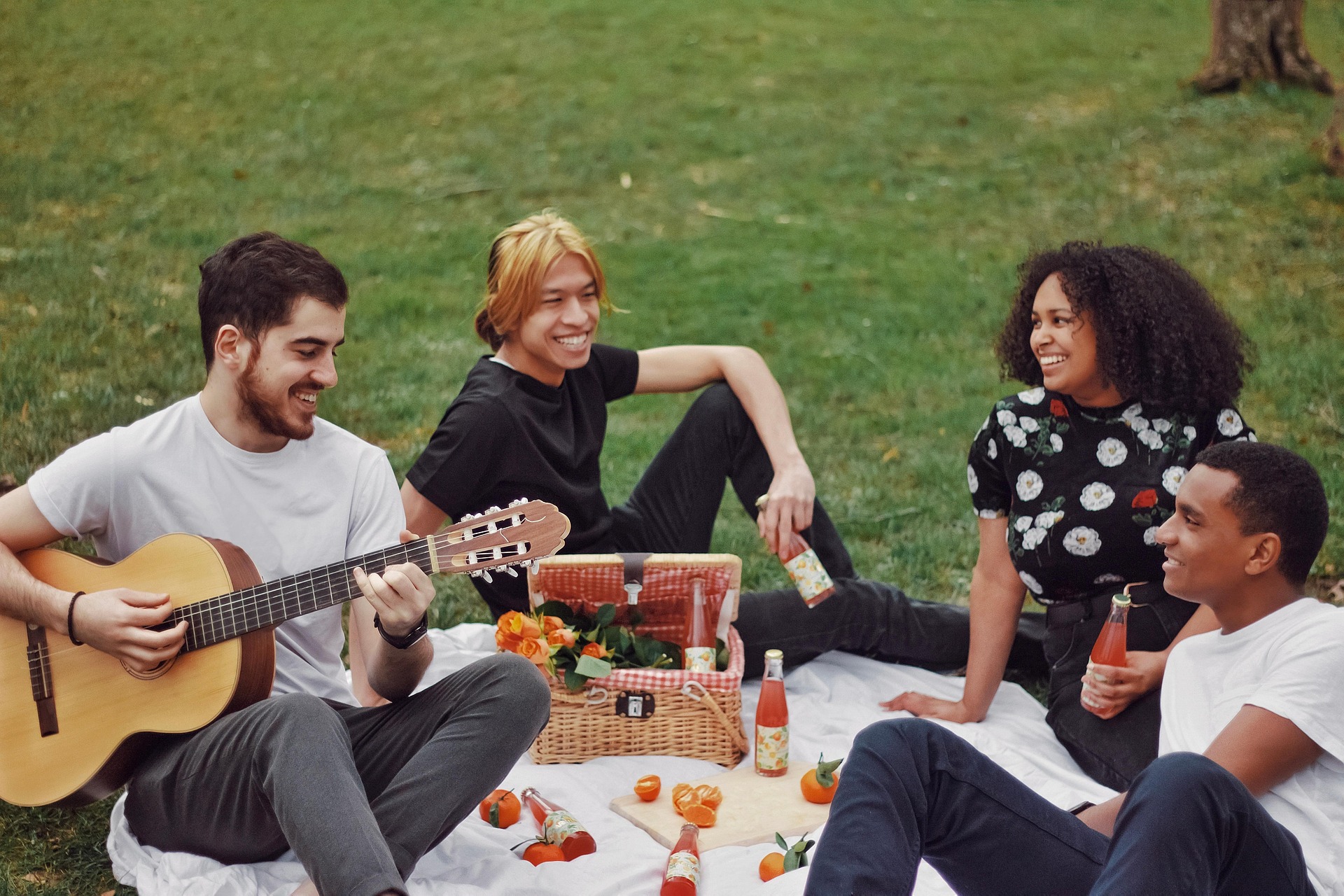 Friends enjoying a picnic at Dolores Park in San Francisco